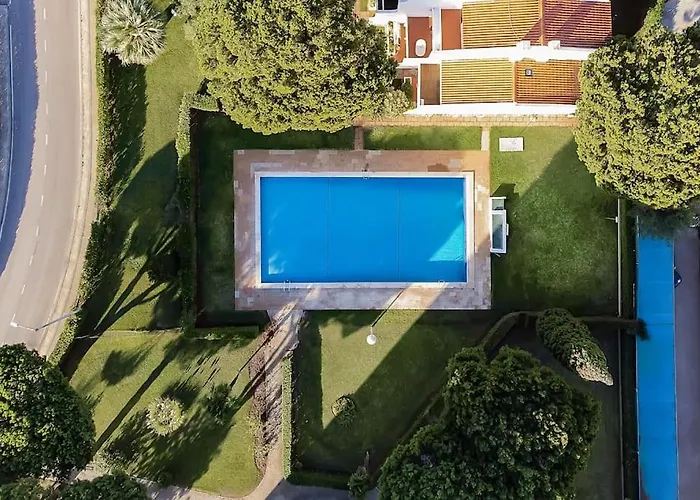 Heaven's Paradise-pool-sunset-1br *